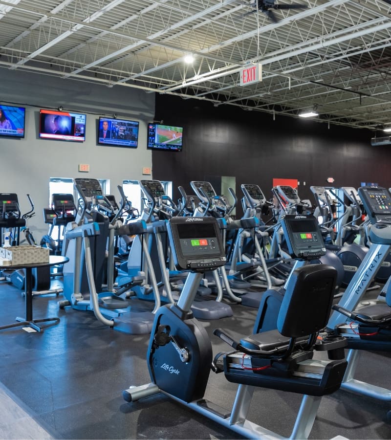 a row of modern cardio equipment at a gym in hershey pa